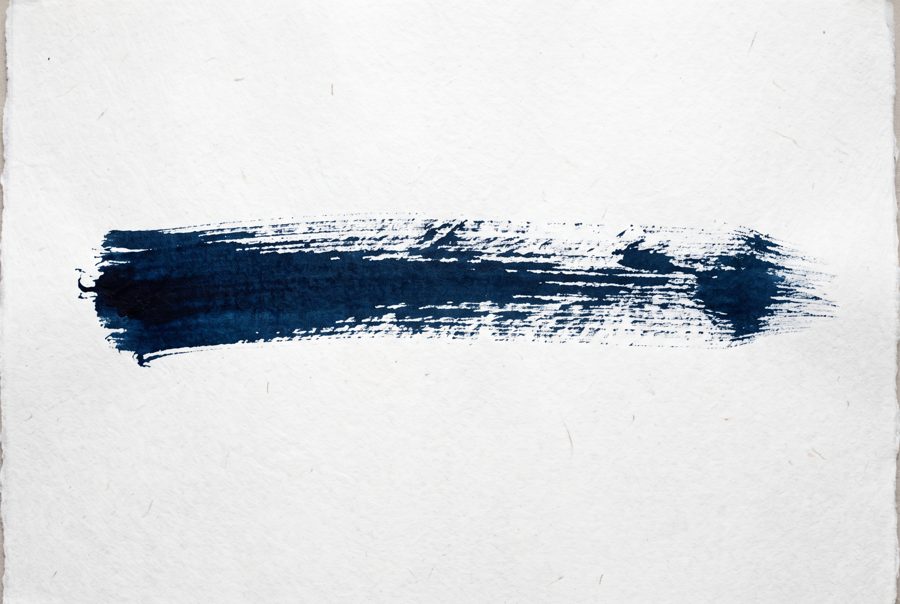 Indigo sumi ink brush stroke on white paper, zen minimal abstract background