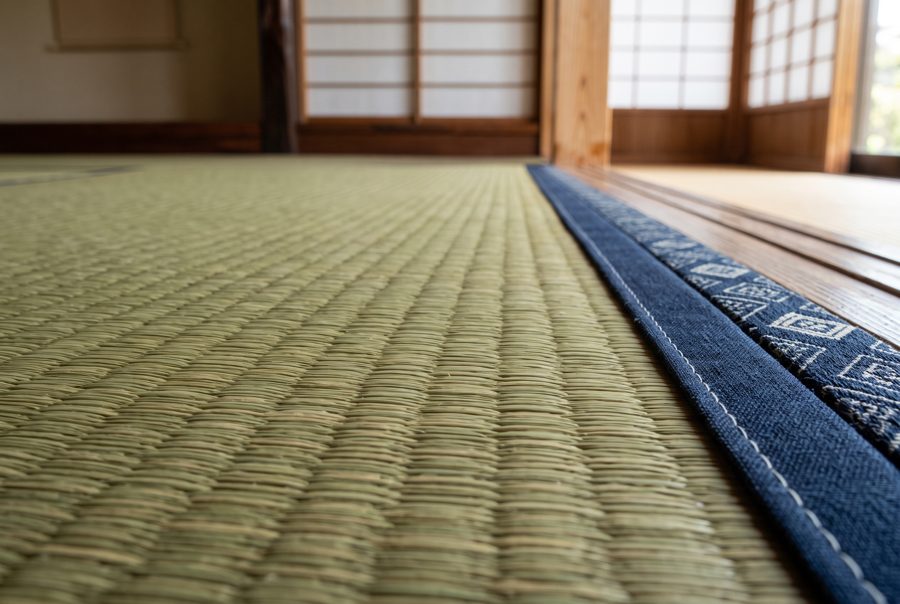 Fresh green tatami mat woven texture with dark border, Japanese interior